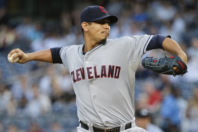 Cleveland Indians pitcher Carlos Carrasco delivers against the New York Yankees during the first inning of a baseball game, Friday, Aug. 21, 2015, in New York. (AP Photo/Julie Jacobson)