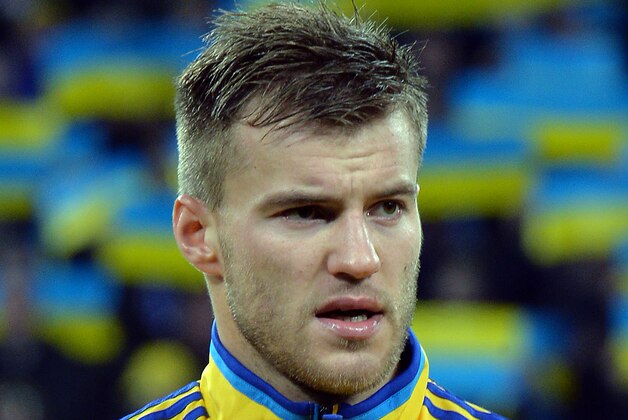 Ukraine's midfielder Andriy Yarmolenko listens to the national anthems  before the start of a World Cup 2014 play-off first-leg football match between Ukraine and France in Kiev on November 15, 2013.        AFP PHOTO / SERGEI SUPINSKY        (Photo credit should read SERGEI SUPINSKY/AFP/Getty Images)