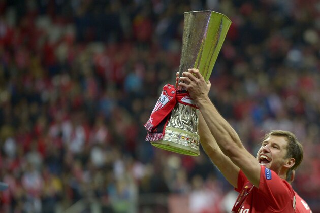 Sevilla's Polish midfielder Grzegorz Krychowiak celebratesafter the UEFA Europa League final football match between FC Dnipro Dnipropetrovsk and Sevilla FC at the Narodowy stadium in Warsaw, Poland on May 27, 2015. Sevilla FC won 2-3.  AFP PHOTO / JORGE GUERRERO        (Photo credit should read Jorge Guerrero/AFP/Getty Images)