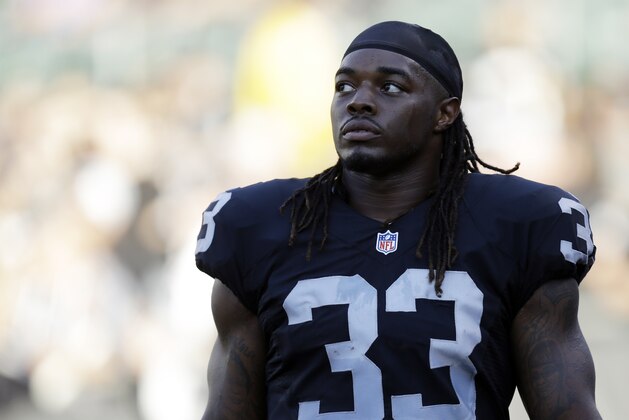 Oakland Raiders running back Trent Richardson (33) warms up before an NFL preseason football game in Oakland, Calif., Friday, Aug. 14, 2015. (AP Photo/Ben Margot)
