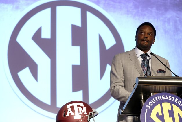 Texas A&M coach Kevin Sumlin speaks to the media at the Southeastern Conference NCAA college football media days, Tuesday, July 14, 2015, in Hoover, Ala. (AP Photo/Butch Dill)