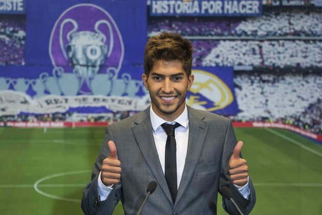 Brazil international soccer player Lucas Silva gestures during his official presentation at the Santiago Bernabeu stadium in Madrid, Spain, Monday, Jan. 26, 2015, after signing for Real Madrid. (AP Photo/Andres Kudacki)