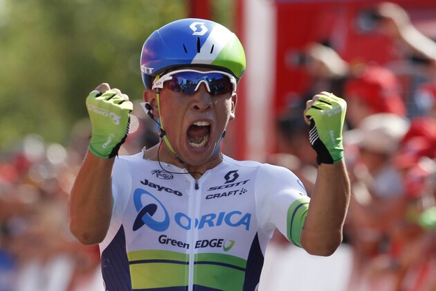 Orica-GreenEdge's Australian cyclist Caleb Ewan crosses the finish line to win during the fifth stage of the 2015 Vuelta Espana cycling tour, a 167.3km stage between Rota and Alcala de Guadaira on August 26, 2015.  AFP PHOTO/JOSE JORDAN        (Photo credit should read BIEL ALINO/AFP/Getty Images)