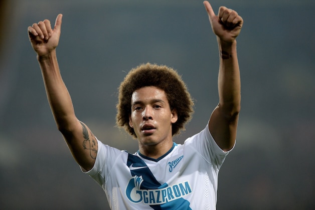 Zenit St. Petersburg Axel Witsel celebrates at end of their Europa League round 16 second leg soccer match with Torino at the Olympic stadium in Turin, Italy, Thursday, March 19, 2015. (AP Photo/  Massimo Pinca)
