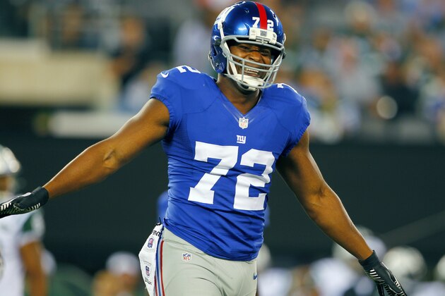 New York Giants defensive end Osi Umenyiora (72) reacts during the first half of a preseason NFL football game against the New York Jets on Saturday, Aug. 18, 2012, in East Rutherford, N.J. (AP Photo/Rich Schultz)