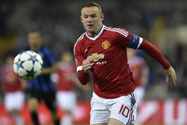 Manchester's Wayne Rooney runs for the ball during the UEFA Champions League play-off round second leg football match between Club Brugge and Manchester United at Jan Breydel stadium in Bruges, Belgium on August 26, 2015. AFP PHOTO / JOHN THYS        (Photo credit should read JOHN THYS/AFP/Getty Images)