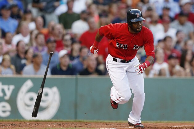 Boston Red Sox's Alejandro De Aza runs on an RBI single during the first inning of a baseball game against the Tampa Bay Rays in Boston, Friday, July 31, 2015. (AP Photo/Michael Dwyer)