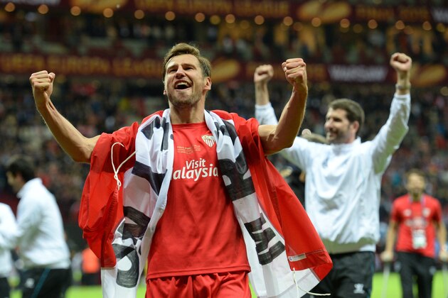 Sevilla's Polish midfielder Grzegorz Krychowiak celebrates after the UEFA Europa League final football match between FC Dnipro Dnipropetrovsk and Sevilla FC at the Narodowy stadium in Warsaw, Poland on May 27, 2015. Sevilla FC won 2-3.    AFP PHOTO / PIOTR HAWALEJ        (Photo credit should read PIOTR HAWALEJ/AFP/Getty Images)