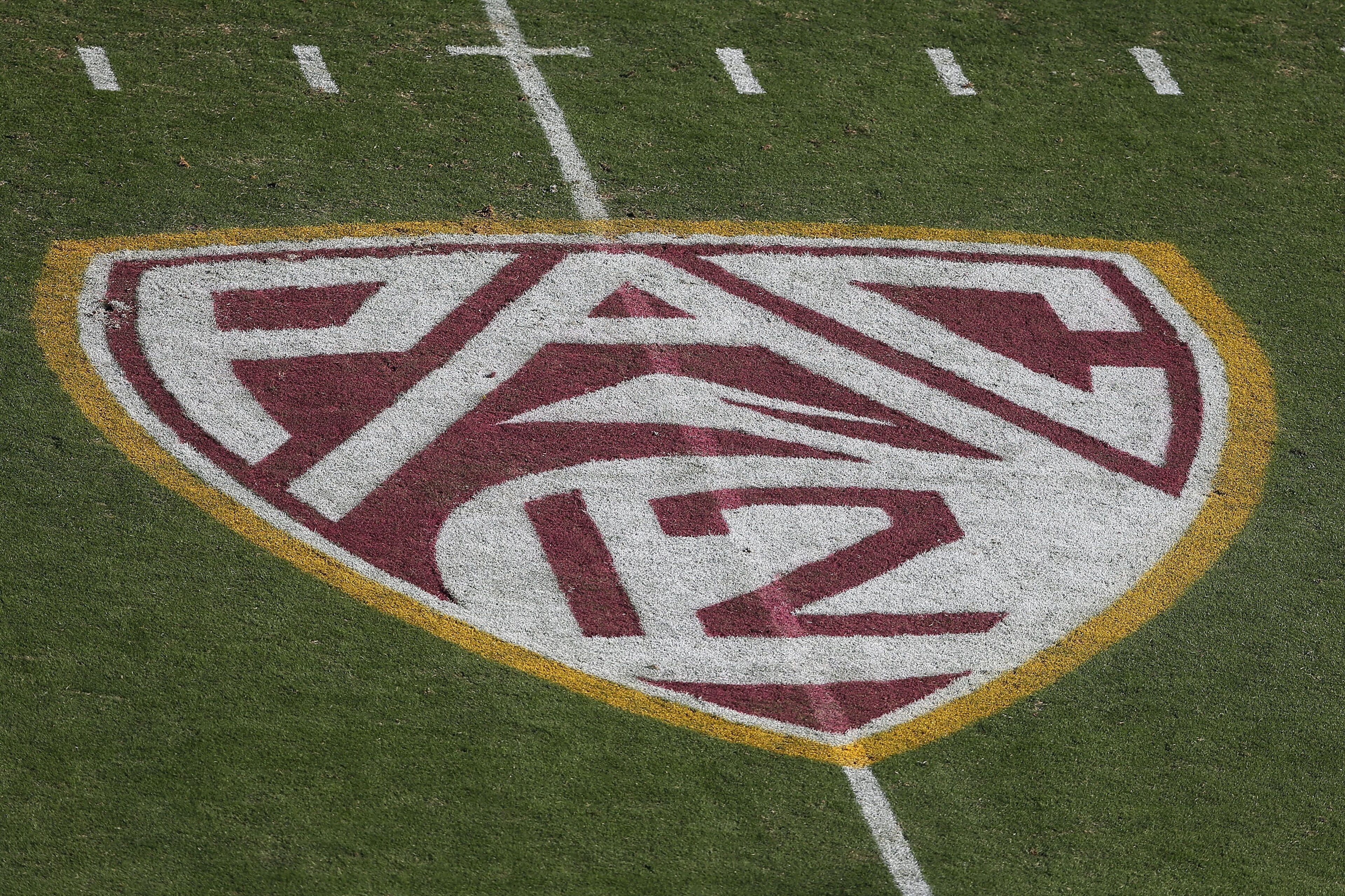 TEMPE, AZ - OCTOBER 19:  The 'Pac 12' logo is displayed on the filed during the college football game between the Washington Huskies and the Arizona State Sun Devils at Sun Devil Stadium on October 19, 2013 in Tempe, Arizona.  The Sun Devils defeated the Huskies 53-24.  (Photo by Christian Petersen/Getty Images)