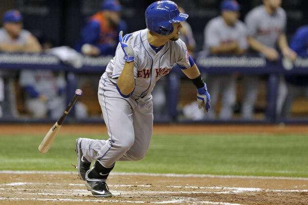 New York Mets' Michael Conforto hits an RBI-double off Tampa Bay Rays relief pitcher Brad Boxberger during the ninth inning of an interleague baseball game Friday, Aug. 7, 2015, in St. Petersburg, Fla. Mets' Lucas Duda scored on the hit. (AP Photo/Chris O'Meara)