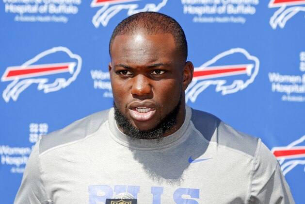 Buffalo Bills' IK Enemkpali, released this week by the New York Jets, speaks to the media at NFL football training camp, Thursday, Aug. 13, 2015, in Pittsford, N.Y. The Bills claimed the second-year player off of waivers on Wednesday, a day after he was released by the Jets because he hit quarterback Geno Smith with a sucker punch, breaking his jaw. (AP Photo/Mike Groll)