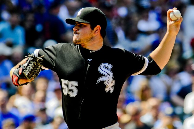 Jul 10, 2015; Chicago, IL, USA; Chicago White Sox starting pitcher Carlos Rodon (55) delivers in the first inning of their game against the Chicago Cubs at Wrigley Field. Mandatory Credit: Matt Marton-USA TODAY Sports