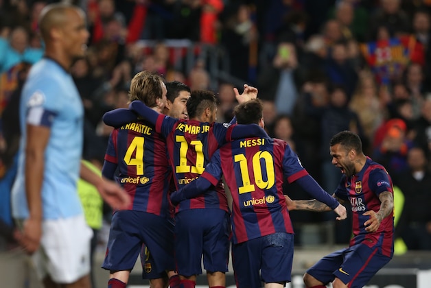 BARCELONA, SPAIN - MARCH 18:  Ivan Raktic of Barcelona is congratulated on his goal by team mates during the UEFA Champions League Round of 16 match between Barcelona and Manchester City at Camp Nou on March 18, 2015 in Barcelona, Spain. (Photo by Ian MacNicol/Getty Images)