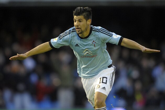 Celta's forward Nolito celebrates after scoring a goal during the Spanish league football match RC Celta de Vigo vs Sevilla FC at the Balaidos stadium in Vigo on March 29, 2014.    AFP PHOTO / MIGUEL RIOPA        (Photo credit should read MIGUEL RIOPA/AFP/Getty Images)