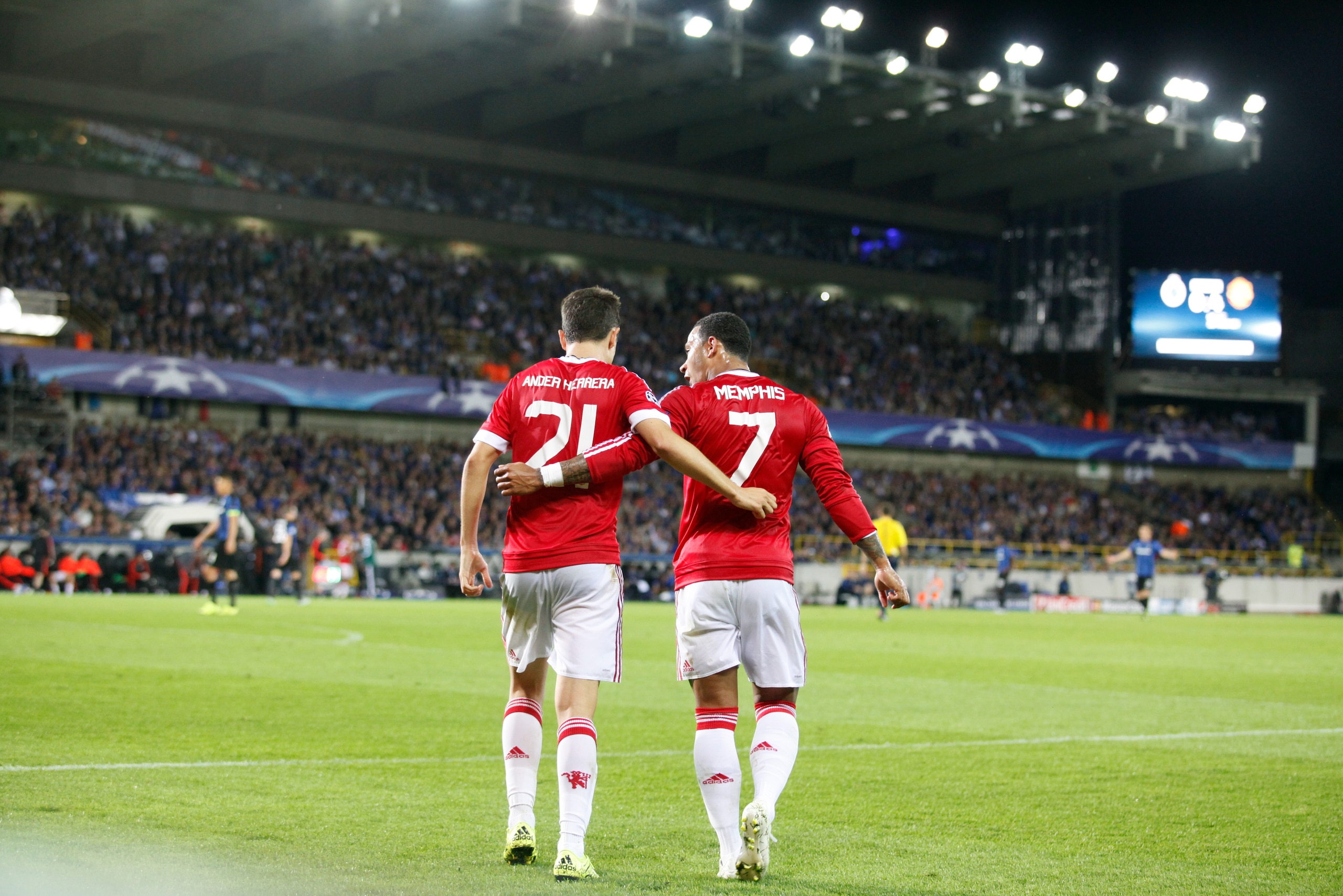 Manchester United’s Memphis Depay, right, and Ander Herrera walk on the pitch during the Champions League play-off round, second leg soccer match at the Jan Breydel Stadium in Brugge, Belgium on Wednesday Aug. 26, 2015. (AP Photo/Francois Walschaerts) Manchester United’s Memphis Depay, right, and Ander Herrera walk on the pitch during the Champions League play-off round, second leg soccer match at the Jan Breydel Stadium in Brugge, Belgium on Wednesday Aug. 26, 2015. (AP Photo/Francois Walschaerts)