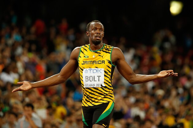 BEIJING, CHINA - AUGUST 27:  Usain Bolt of Jamaica celebrates after crossing the finish line to win gold in the Men's 200 metres final during day six of the 15th IAAF World Athletics Championships Beijing 2015 at Beijing National Stadium on August 27, 2015 in Beijing, China.  (Photo by Christian Petersen/Getty Images for IAAF)