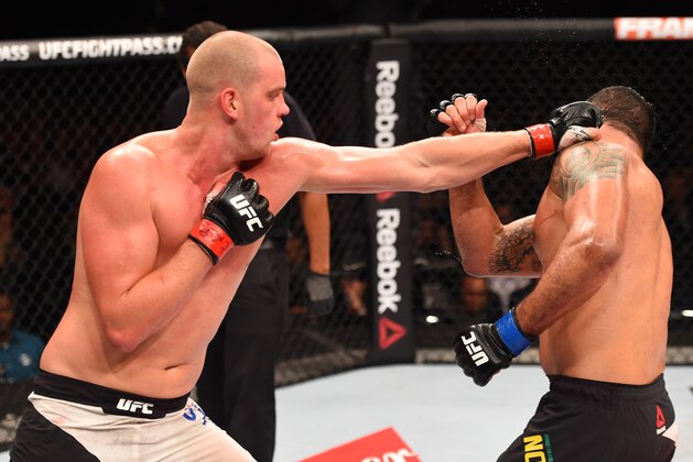 RIO DE JANEIRO, BRAZIL - AUGUST 01:  (L-R) Stefan Struve of the Netherlands punches Rodrigo 'Minotauro' Nogueira of Brazil  in their heavyweight bout during the UFC 190 event inside HSBC Arena on August 1, 2015 in Rio de Janeiro, Brazil.  (Photo by Josh Hedges/Zuffa LLC/Zuffa LLC via Getty Images)