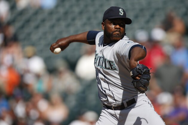 Seattle Mariners relief pitcher Fernando Rodney (56) works against the Colorado Rockies in the ninth inning of an interleague baseball game Wednesday, Aug. 5, 2015, in Denver. Colorado won 7-5 in 11 innings. (AP Photo/David Zalubowski)