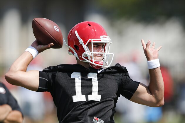 FILE - In this Aug. 4, 2015, file photo, Georgia quarterback Greyson Lambert works during a college football practice in Athens, Ga. Lambert is competing for the starting job. (AP Photo/John Bazemore, File)