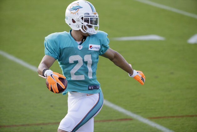 Miami Dolphins cornerback Brent Grimes runs through drills at the teams NFL football training camp, Wednesday, Aug. 5, 2015 in Davie, Fla. (AP Photo/Wilfredo Lee)