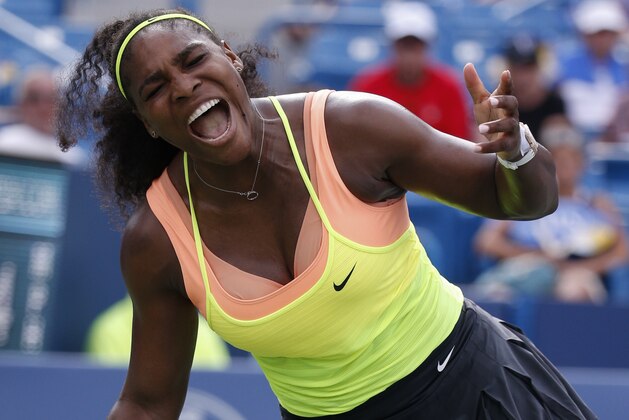 Serena Williams reacts during the women's final against Simona Halep, of Romania, at the Western & Southern Open tennis tournament, Sunday, Aug. 23, 2015, in Mason, Ohio. (AP Photo/John Minchillo)