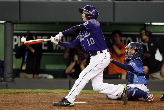 Pearland, Texas' Caleb Low (10) connects with a pitch from Bonita, Calif.'s Jacob Baptista for a walkoff two-run home run during the eighth inning of a United States elimination baseball game at the Little League World Series tournament in South Williamsport, Pa., Thursday, Aug. 27, 2015. Pearland, Texas won 9-7. (AP Photo/Gene J. Puskar)