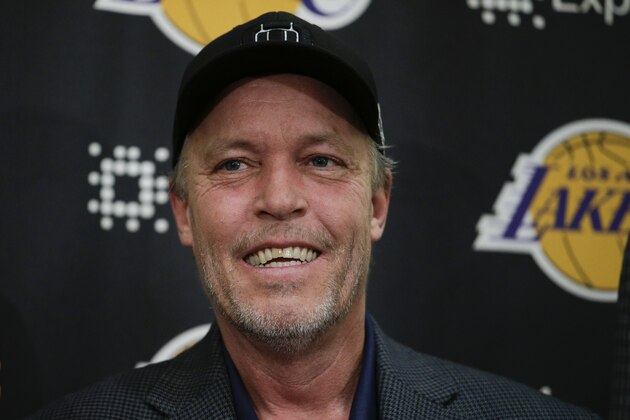 Los Angeles Lakers part-owner Jim Buss attends a news conference held to introduce the team's new draft picks, Monday, June 29, 2015, in El Segundo, Calif.  (AP Photo/Jae C. Hong)