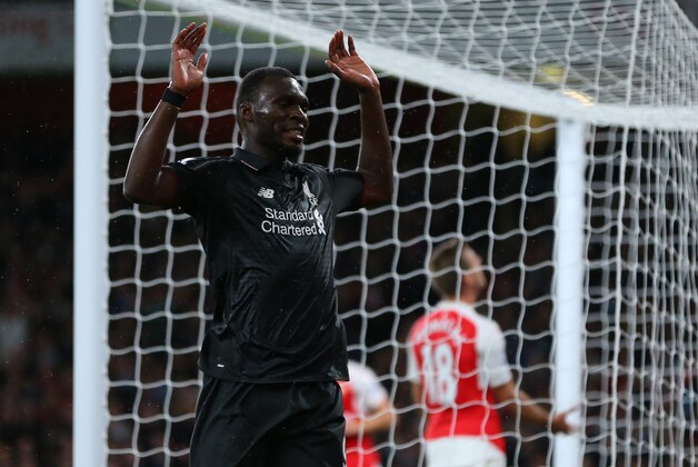 LONDON, ENGLAND - AUGUST 24:  Christian Benteke of Liverpool reacts after missing a chance to score during the Barclays Premier League match between Arsenal and Liverpool at the Emirates Stadium on August 24, 2015 in London, United Kingdom.  (Photo by Catherine Ivill - AMA/Getty Images)