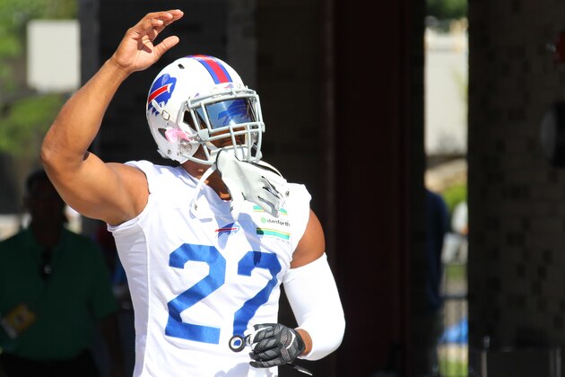 Buffalo Bills running back Fred Jackson waves to fans during their NFL football training camp in Pittsford, N.Y., Friday, July 31, 2015. (AP Photo/Bill Wippert)