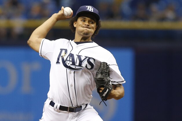 ST. PETERSBURG, FL - AUGUST 26:  Chris Archer #22 of the Tampa Bay Rays pitches during the first inning of a game against the Minnesota Twins on August 26, 2015 at Tropicana Field in St. Petersburg, Florida.  (Photo by Brian Blanco/Getty Images)