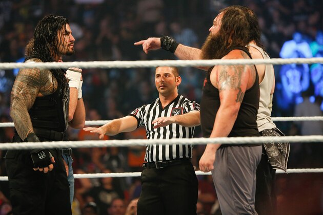 NEW YORK, NY - AUGUST 23:  Roman Reigns and Bray Wyatt stare each other down at the WWE SummerSlam 2015 at Barclays Center of Brooklyn on August 23, 2015 in New York City.  (Photo by JP Yim/Getty Images)
