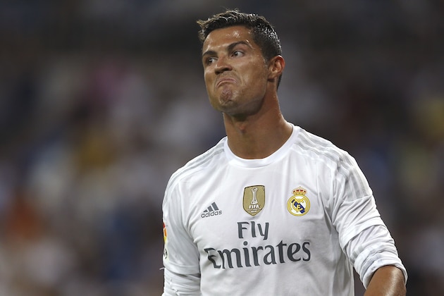 Real Madrid's Cristiano Ronaldo grimaces during the Santiago Bernabeu trophy soccer match between Real Madrid and Galatasaray at the Santiago Bernabeu Stadium in Madrid, Spain, Tuesday, Aug. 18, 2015. Real Madrid won 2-1. (AP Photo/Francisco Seco)