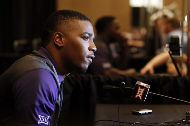TCU quarterback Trevone Boykin talks with reporters during Big 12 Conference Football Media Days Monday, July 20, 2015, in Dallas. (AP Photo/Tony Gutierrez)