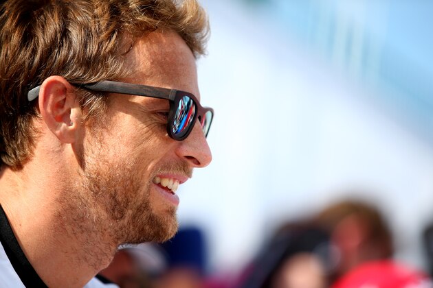 NORTHAMPTON, ENGLAND - JULY 04:  Jenson Button of Great Britain and McLaren Honda looks on during a signing session after qualifying for the Formula One Grand Prix of Great Britain at Silverstone Circuit on July 4, 2015 in Northampton, England.  (Photo by Mark Thompson/Getty Images)
