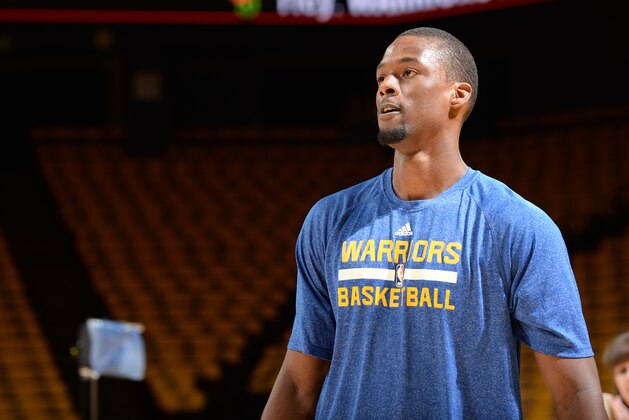 OAKLAND, CA - MAY 19: Harrison Barnes #40 of the Golden State Warriors warms up before facing off against the Houston Rockets for Game One of the Western Conference Finals during the NBA Playoffs on May 19, 2015 at ORACLE Arena in Oakland, California.  NOTE TO USER: User expressly acknowledges and agrees that, by downloading and or using this Photograph, user is consenting to the terms and conditions of the Getty Images License Agreement.  Mandatory Copyright Notice: Copyright 2015 NBAE (Photo by Noah Graham/NBAE via Getty Images)
