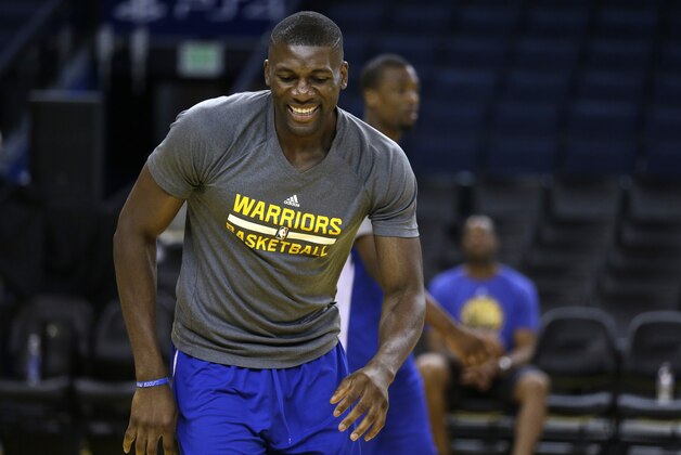 Golden State Warriors' Festus Ezeli during NBA basketball practice, Friday, June 5, 2015, in Oakland, Calif. The Golden State Warriors host the Cleveland Cavaliers in Game 2 of the NBA Finals on Sunday. (AP Photo/Ben Margot)