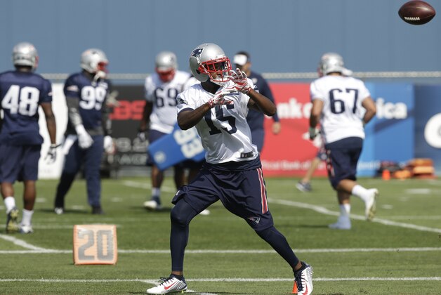 New England Patriots wider receiver Reggie Wayne (15) makes a catch during an NFL football practice in Foxborough, Mass., Wednesday, Aug. 26, 2015. (AP Photo/Steven Senne) New England Patriots wider receiver Reggie Wayne (15) makes a catch during an NFL football practice in Foxborough, Mass., Wednesday, Aug. 26, 2015. (AP Photo/Steven Senne)