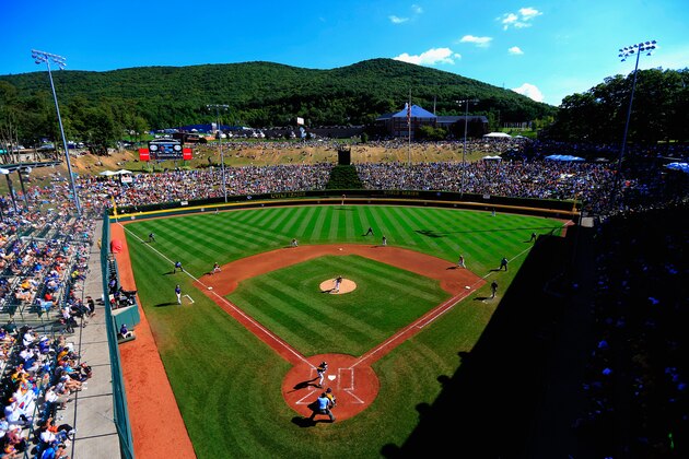 SOUTH WILLIAMSPORT, PA - AUGUST 24:  Team Asia-Pacific  bats against the Great Lakes Team from Chicago, Illinois during the Little League World Series Championship game at Lamade Stadium on August 24, 2014 in South Williamsport, Pennsylvania.  (Photo by Rob Carr/Getty Images)