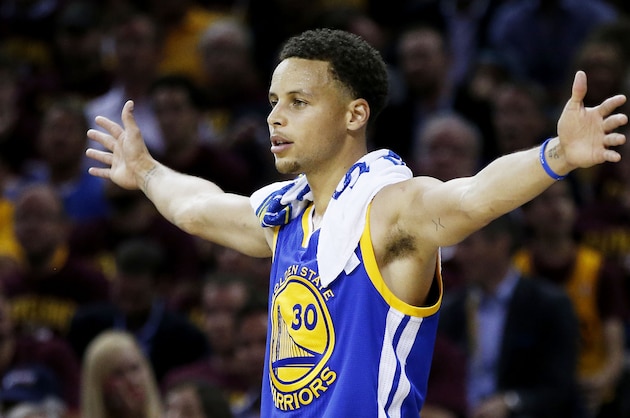 CLEVELAND, OH - JUNE 16:  Stephen Curry #30 of the Golden State Warriors reacts during Game Six of the 2015 NBA Finals against the Cleveland Cavaliers at Quicken Loans Arena on June 16, 2015 in Cleveland, Ohio. NOTE TO USER: User expressly acknowledges and agrees that, by downloading and or using this photograph, user is consenting to the terms and conditions of Getty Images License Agreement.  (Photo by Ezra Shaw/Getty Images)