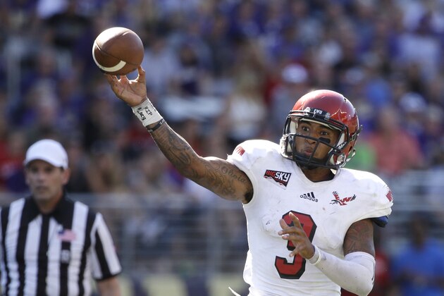 FILE - In this Sept. 6, 2014, file photo, Eastern Washington quarterback Vernon Adams Jr. throws a pass against the Washington Huskies in the second half of an NCAA college football game  in Seattle, Wash.  Oregon’s quest to replace quarterback Marcus Mariota has already seen its share of drama and talented transfer Adams finally arrived on campus after a cliffhanger finish to his Eastern Washington career.  (AP Photo/Elaine Thompson, File)