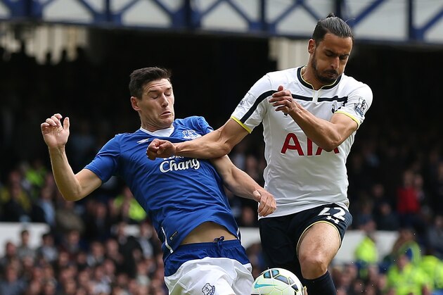 LIVERPOOL, ENGLAND - MAY 24: Gareth Barry of Everton in action with Nacer Chadli of Tottenham Hotspur during the Barclays Premier League match between Everton and Tottenham Hotspur at Goodison Park on May 24, 2015 in Liverpool, England. (Photo by Chris Brunskill/Getty Images)
