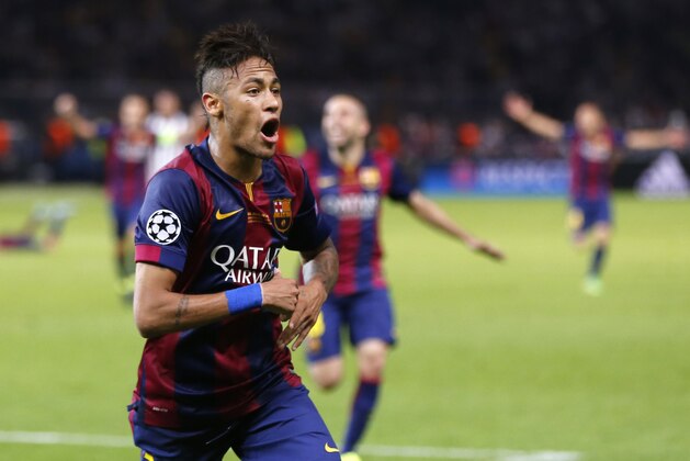 Barcelona's Neymar celebrates after scoring his side's third goal during the Champions League final soccer match between Juventus Turin and FC Barcelona at the Olympic stadium in Berlin Saturday, June 6, 2015. (AP Photo/Michael Probst)
