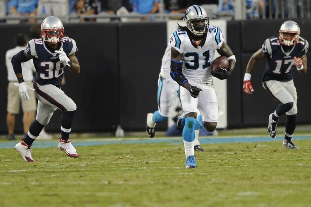 Carolina Panthers' Charles Tillman (31) returns a fumble against the New England Patriots during the first half of a preseason NFL football game in Charlotte, N.C., Friday, Aug. 28, 2015. (AP Photo/Mike McCarn)
