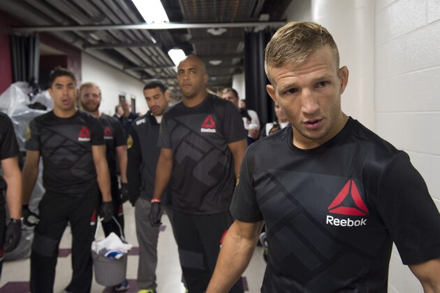 CHICAGO, IL - JULY 25:  UFC bantamweight champion TJ Dillashaw warms up backstage before facing Renan Barao of Brazil in their UFC bantamweight championship bout during the UFC event at the United Center on July 25, 2015 in Chicago, Illinois. (Photo by Mike Roach/Zuffa LLC/Zuffa LLC via Getty Images)