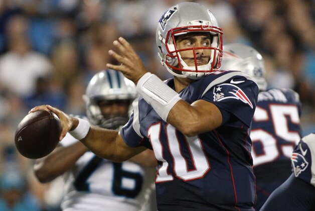 New England Patriots' Jimmy Garoppolo (10) looks to pass against the Carolina Panthers during the second half of a preseason NFL football game in Charlotte, N.C., Friday, Aug. 28, 2015. (AP Photo/Bob Leverone)