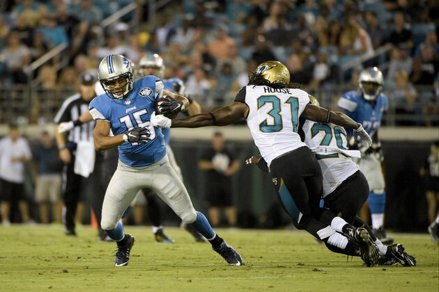 Detroit Lions wide receiver Golden Tate (15) moves away from Jacksonville Jaguars defensive back Davon House (31) during the first half of an NFL preseason football game in Jacksonville, Fla., Friday, Aug. 28, 2015.(AP Photo/Phelan M. Ebenhack)