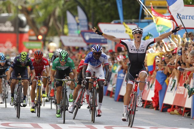 Trek's Belgian cyclist Jasper Stuyven (R) celebrates winning the eighth stage of the 2015 Vuelta Espana cycling tour, a 182.5 km stage between Puebla de Don Fadrique and Murcia on August 29, 2015.  AFP PHOTO/ JOSE JORDAN        (Photo credit should read JOSE JORDAN/AFP/Getty Images)