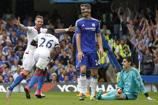 Crystal Palaces French midfielder Bakary Sako (2nd L) celebrates after scoring his team's first goal during the English Premier League football match between Chelsea and Crystal Palace at Stamford Bridge in London on August 29, 2015. AFP PHOTO / IAN KINGTON

RESTRICTED TO EDITORIAL USE. No use with unauthorized audio, video, data, fixture lists, club/league logos or 'live' services. Online in-match use limited to 75 images, no video emulation. No use in betting, games or single club/league/player publications.        (Photo credit should read IAN KINGTON/AFP/Getty Images)