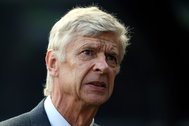 Arsenal's manager Arsene Wenger awaits the start of their English Premier League soccer match between Newcastle United and Arsenal at St James' Park, Newcastle, England, Saturday, Aug. 29, 2015. (AP Photo/Scott Heppell)