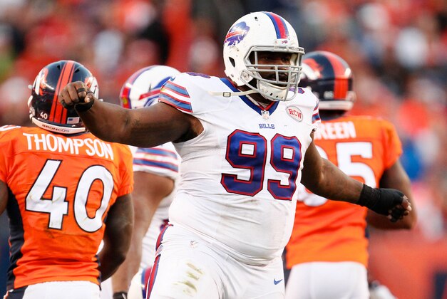 Dec 7, 2014; Denver, CO, USA; Buffalo Bills defensive tackle Marcell Dareus (99) reacts after a play in the third quarter against the Denver Broncos. The Broncos defeated the Bills 24-17. Mandatory Credit: Isaiah J. Downing-USA TODAY Sports Dec 7, 2014; Denver, CO, USA; Buffalo Bills defensive tackle Marcell Dareus (99) reacts after a play in the third quarter against the Denver Broncos. The Broncos defeated the Bills 24-17. Mandatory Credit: Isaiah J. Downing-USA TODAY Sports